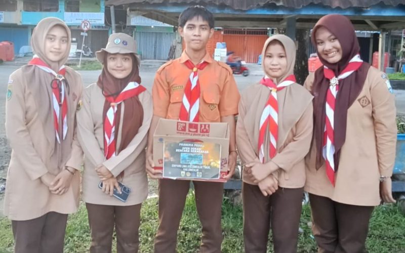 Sebagai Bentuk Kepedulian, Pramuka di Simeulue Galang Dana Untuk Korban Kebakaran. Foto: Agamsyah/Noa.co.id.