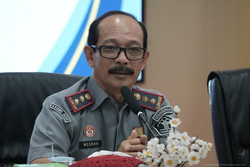 Kepala Kantor Wilayah Kemenkumham Aceh, Meurah Budiman saat Rapat Pemadanan Data PPNS Kementerian/Lembaga Pemerintah Non Kementerian di Provinsi Aceh, Banda Aceh, Senin (11/11/2024). (Foto : Humas Kanwil Kemenkumham Aceh).